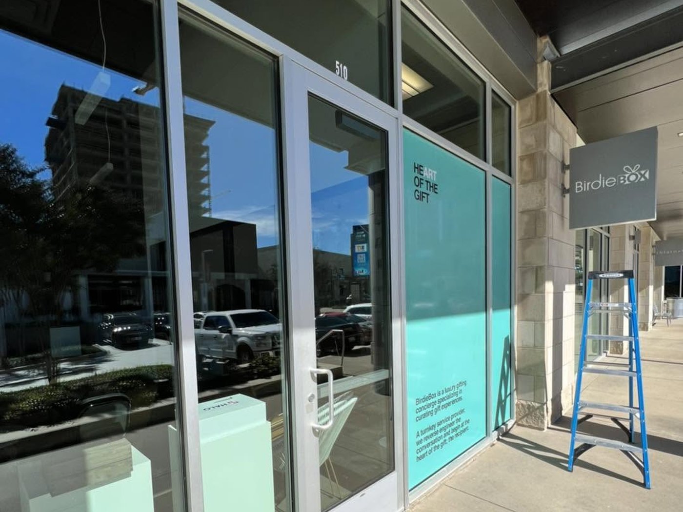 Freshly cleaned storefront windows at a North Texas retail shop